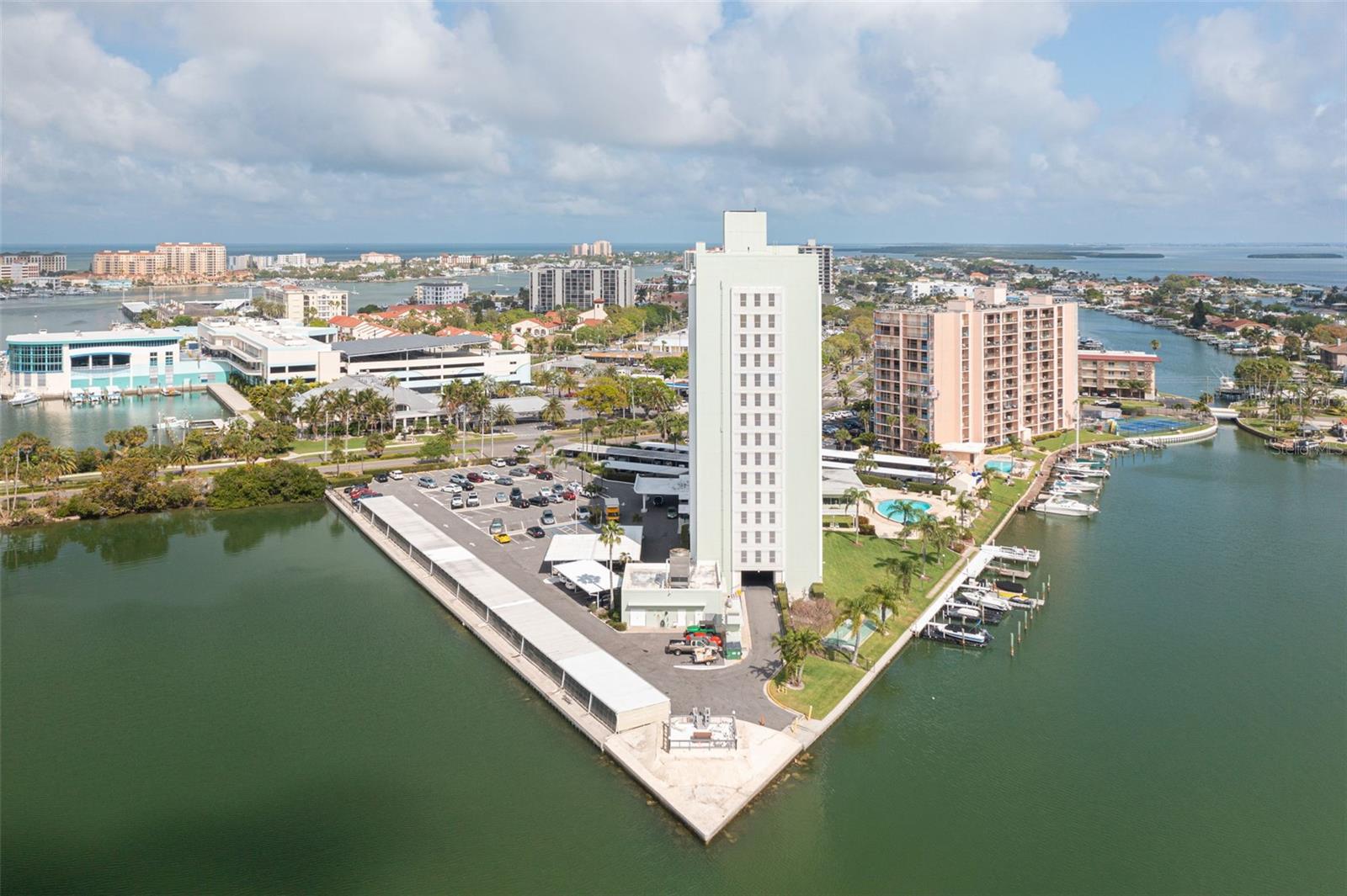 Welcome to your dream coastal retreat! This stunning end-unit condo at Horizon House is the one you've been waiting for—spacious, stylish, and filled with sunshine. As one of the largest units available, it offers two generous bedrooms and two full bathrooms, all with captivating water views from both the living room and bedrooms.
Step inside and feel instantly at home with luxury vinyl plank flooring throughout, giving the space a fresh and modern feel. The master suite is your personal sanctuary—perfect for unwinding after a beach day or simply soaking in the serenity.
But the magic doesn’t stop there! Horizon House is a true slice of paradise with incredible amenities: first come first serve boat slips, a grill area, a heated pool, an outdoor shower, and those breathtaking million-dollar views that make every day feel like a vacation.
Just a short, scenic stroll away lies world-renowned Clearwater Beach, famous for its powdery white sand and vibrant beach life. Whether you’re relaxing in the living room, sipping your morning coffee, or floating in the pool, you’ll enjoy sweeping vistas of the Intracoastal Waterway and the Clearwater Aquarium—with dolphins often playing right in view!
And talk about easy living—this condo covers it all: internet, cable, landscaping, pool maintenance, roof replacement, water, sewer, trash. All that is left for you to pay is electric! It’s truly hassle-free, luxury-style living with double-door key fob access for peace of mind.
Located at 31 Island Way, you’re at the gateway to Island Estates, a lively, walkable neighborhood packed with everything you need—grocery stores, restaurants, shops, and entertainment—just moments from your doorstep.
With inspections completed and assessments fully paid, this condo is move-in ready and waiting for you.
This isn't just a home—it's a lifestyle. One filled with sunshine, salt air, and spectacular views.
Don’t miss your chance to live the island dream. Begin Your Paradise Life today!