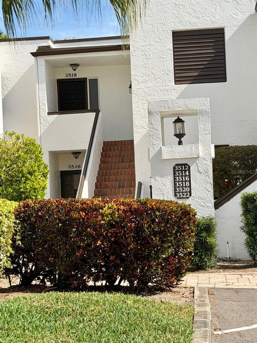 This inviting 2-bedroom, 2-bath second-floor condo (no elevator) offers a serene escape. It literally defines it!  ... This spacious retreat is a bright, open, airy Mediterranean-style, gifted with an exceptional LOCATION, LOCATION, LOCATION to which few can compare. It's accessibility accentuates the acres of mature, pristine surroundings and MORE...  Overlooking the 16th Green of 'the Meadows' golf course, squarely positioned, on the rear center of the Green, looking due East, straight up the plush Fairway, complete with the daily sunrise, including bunkers and water, IT HAS A VIEW THAT DOESN'T QUIT!  It's an everyday viewing pleasure. Relax & admire, invite & entertain, whatever you do... ENJOY THE VIEW! from the TWO private lanais. This condo is Beautifully decorated with shiny laminate floors. 
Enjoy the convenience of assigned covered parking and a light, comfortable interior designed for relaxed Florida living. The prime location places you just minutes from an array of dining options, boutique and major retail shopping, the Town Center Mall, and the brand-new Mote Marine Aquarium. COME ENJOY OUR BEAUTIFUL GULF COAST BEACHES.
Cultural attractions are also close by, including the renowned Ringling Museum, Asolo Repertory Theatre, Van Wezel Performing Arts Hall, and the vibrant shops and restaurants of St. Armands Circle. Whether you're seeking leisure, culture, or outdoor recreation, this condo offers an ideal seasonal getaway in the heart of Sarasota. NO PETS ALLOWED AND NON SMOKING UNIT.