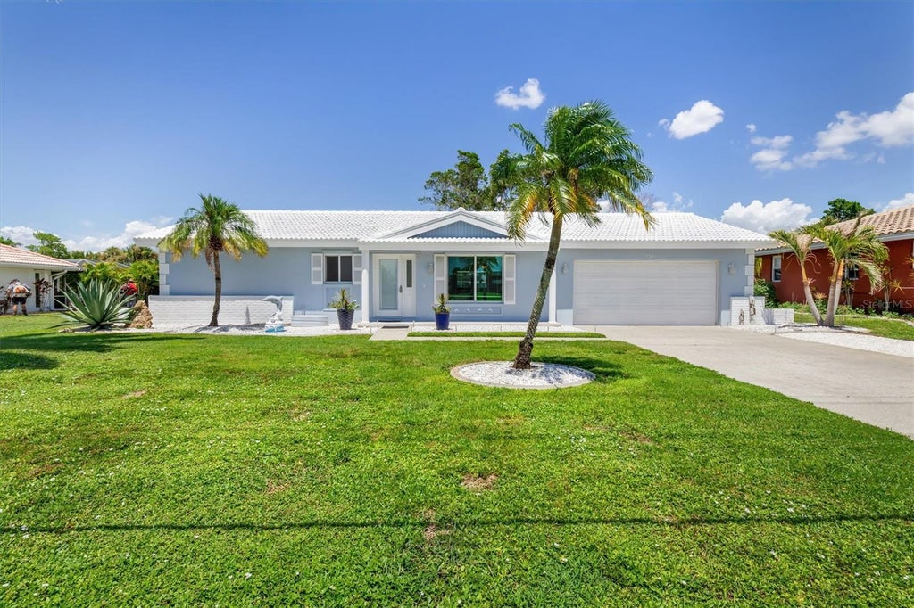 Photo of 1336 Aqui Esta Drive, Punta Gorda, FL 33950 (MLS # C7530079)