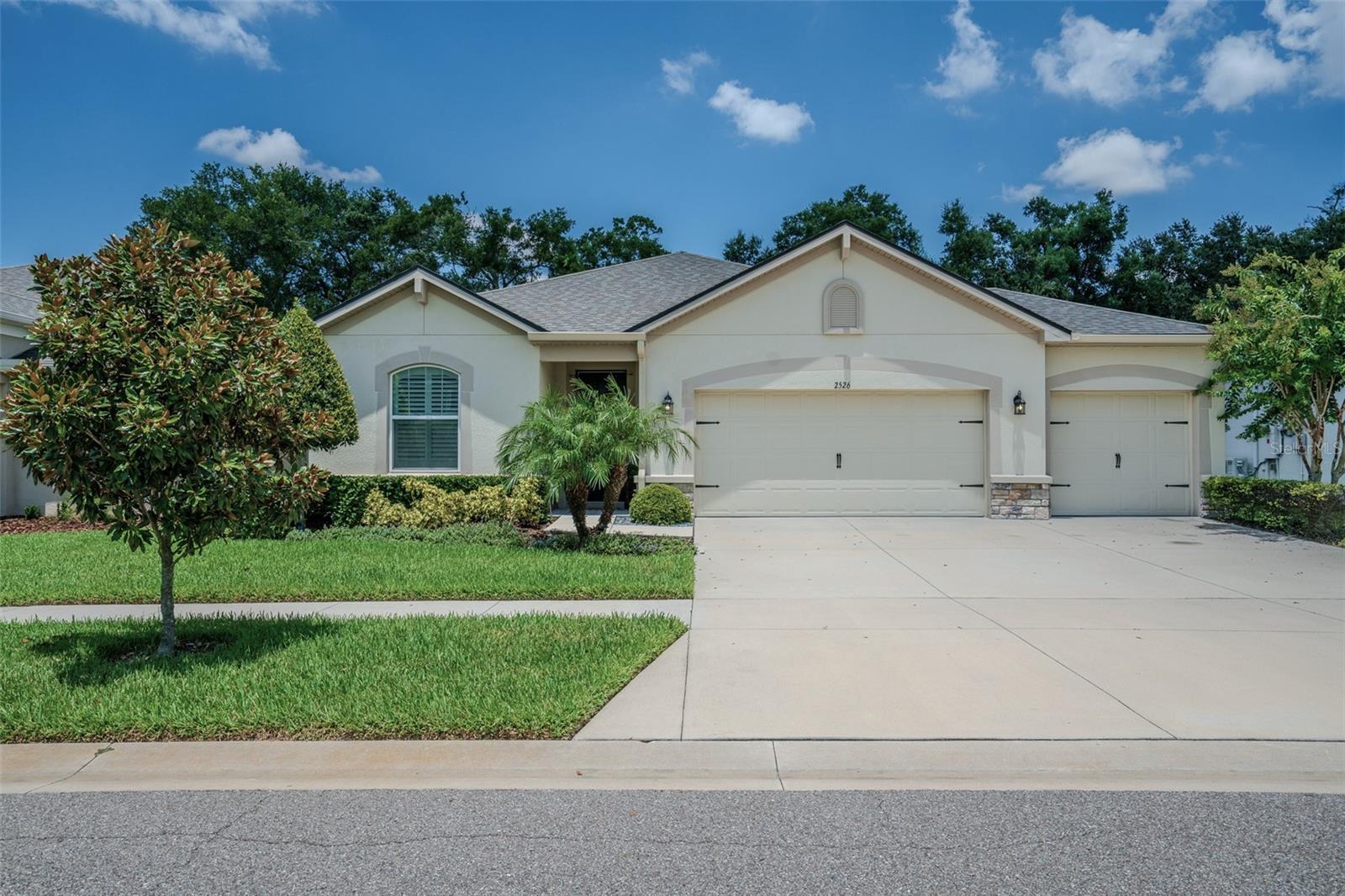 Stunning residence, built just five years ago, nestled within a quaint community and maintained with exceptional care by it's sole owner. This gem boast 3 bedrooms, 2 bathrooms, ad a versatile flex room adorned with French doors. The primary suite includes a bathroom and two spacious walk-in closets. Brand new carpeting in the bedrooms adds a fresh touch. The residence shines with luxury vinyl flooring throughout its open-concept layout. You'll appreciate the elegant quartz countertops, walk in pantry, bespoke lighting, and a custom paint that add unique character to every room. Privacy and energy efficiency are paramount with custom plantation shutters on all windows, double -pane lo-E windows, and a floor to ceiling lo-E sliders. The screened patio is a gateway to an expansive backyard, perfectly sized for a potential pool, enclosed by a durable vinyl fence for complete privacy. Call today to schedule a showing!