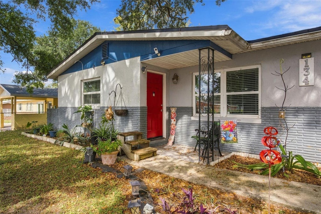 Photo of 134 Grove Drive, Haines City, FL 33844 (MLS # O6453664)