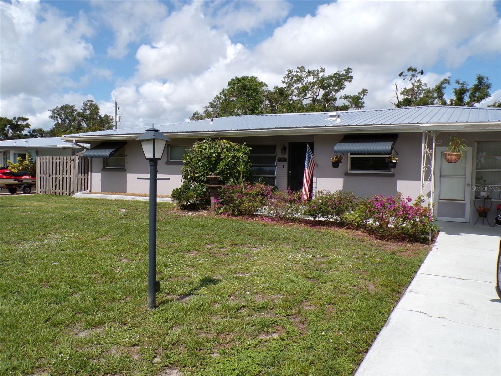 Discover your new, spacious 1711 square foot, move-in-ready sanctuary at 2787 Jay Place, a meticulously maintained 2+bedroom (bonus room, “under air,” can be used as a third bedroom), 2-bathroom home nestled on a spacious corner lot in historic Kensington Park, Sarasota. This special find offers a peaceful retreat with an array of thoughtful updates and amenities, all within easy reach of Sarasota's vibrant downtown, world-famous beaches, UTC shopping district, SRQ airport, and I-75. From the moment you arrive, you'll appreciate the quiet charm of this home. Step inside to find ceramic tile throughout and fresh interior paint, setting a serene tone. The home boasts a versatile bonus room and a dedicated indoor laundry/utility room, complete with a Speed Queen commercial-quality washer and dryer. Entertain or unwind on the large patio, adjacent to a delightful butterfly, bird, and bee sanctuary, and refresh with an outdoor shower. The large, fenced corner lot provides ample privacy and features established fruit trees, including a 25-foot avocado, Naval orange, Meyer lemon, and green fig, along with magnificent Magnolia and Royal Empress trees. A vinyl-coated mini-mesh chain-link fenced-in area (16.5' x 24.5') with a covered top and cemented base is perfect for a dog run or even an orchid garden, completely safe from predators.
This home offers true peace of mind with significant recent upgrades:
Brand NEW metal roof (2025): West and South facing roofs feature special standing-seam metal, ready for solar installation without compromising the roof.
Underground Florida Power and Light utility with NEW electric meter (2025).
Entire attic completely sealed with open cell spray foam, rafters and floors (2023).
Large 16 SEER Lennox HVAC and duct system with UV kit (2024) for protection against biological growth. Control it all with a Honeywell wireless Smart thermostat.
Brand NEW matching top-of-the-line, wireless Thin-Q, LG BL Stainless-steel appliances (2024), including a convertible drawer refrigerator, dishwasher, electric range, and microwave.
Stainless steel double kitchen sink with Insinkerator waste disposal.
New toilets in both bathrooms (2022).
Ceiling fans in bedrooms, kitchen, utility room, flex room, and two in the Florida room ensure comfort.
Iron sewer pipes are completely descaled and lined by PRS Pipe Restoration Solutions (2023).
Gutters front and back.
This amazingly well-maintained, low-maintenance home truly has "no surprises" and is ready for its next chapter. Don't miss this opportunity to own a piece of Kensington Park paradise! Book your appointment to see this amazing home now!