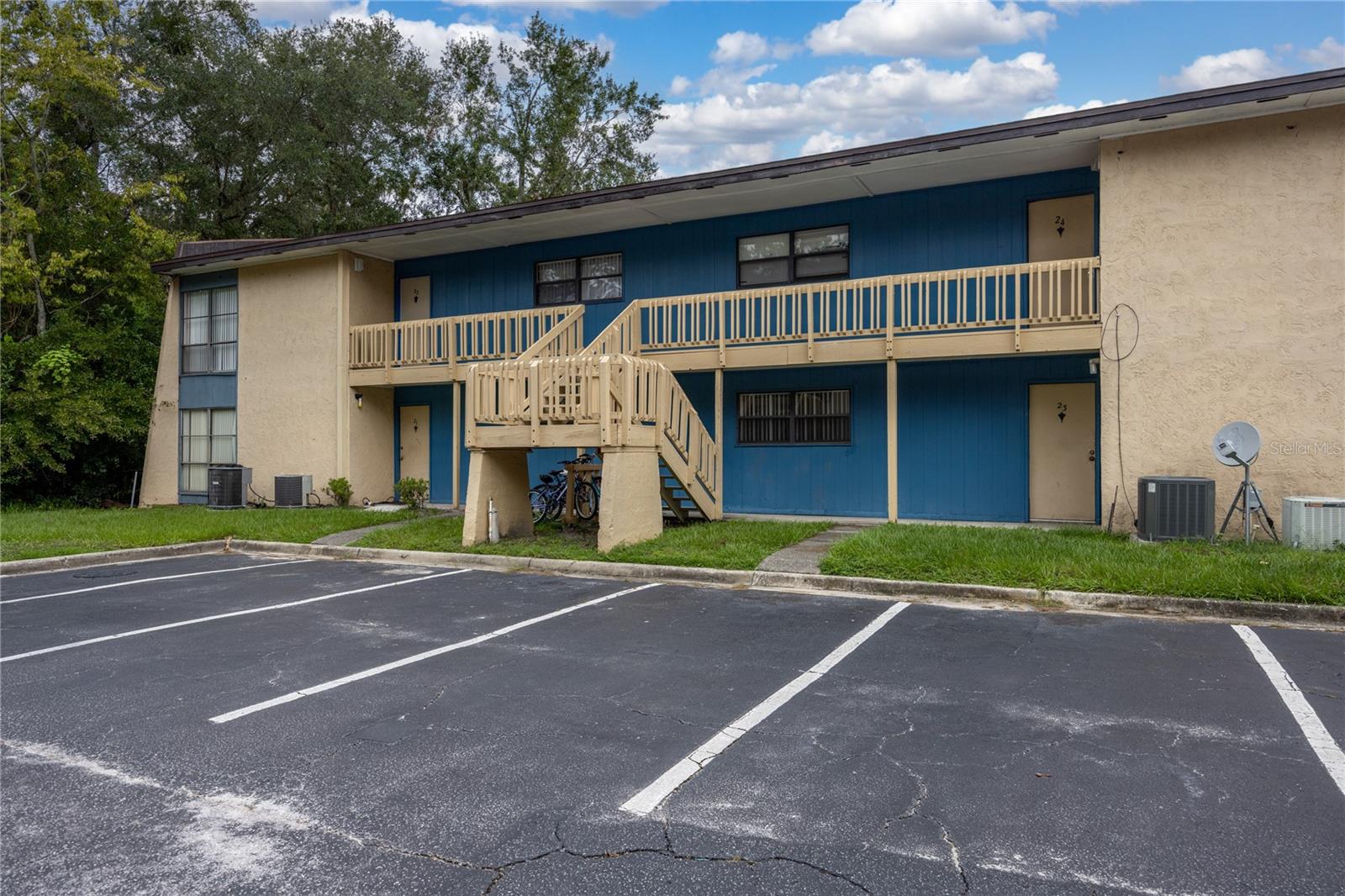 This 2-bed, 2-bath features a spacious floor plan, a cozy living room/dining room combo, and a nice sized kitchen. New AC! New Paint! The primary suite boasts an ensuite bathroom for added convenience. Enjoy the close proximity to restaurants and shopping in Butler Plaza and Celebration Pointe. With UF and UF Health just a stone's throw away, convenience meets comfort. This condo comes with fantastic amenities, including a clubhouse with a pool table, ping pong table, and a large TV for entertainment. There is more! Enjoy the pool or stay active with the exercise room. Take advantage of on-site laundry facilities for ultimate convenience. The HOA takes care of exterior maintenance, lawn care, pest control, water, and even provides high-speed internet from GatorNet. Plus, with direct RTS bus routes on Archer Rd, commuting is a breeze.