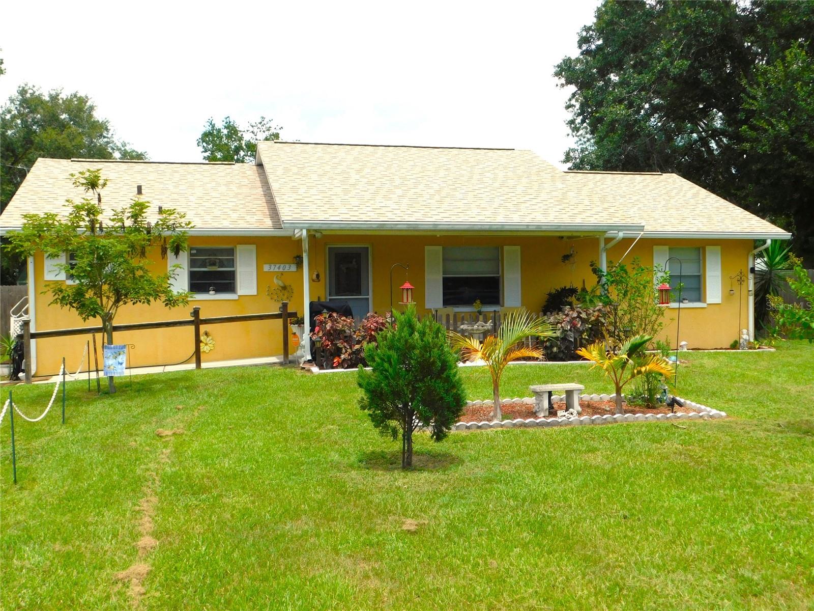 Welcome to this charming 3-bedroom, 2-bath home tucked away on a quiet private street on about an acre of land. Huge backyard for family get togethers, fenced in area perfect for pets or a pool.
The kitchen features new appliances and plenty of cabinet space, with an adjacent dining area—both finished with easy-to-maintain laminate flooring. The spacious living room is perfect for entertaining, complete with ceiling fans and matching laminate floors.
The master bedroom includes an en-suite bath with a walk-in shower, while the two additional bedrooms are located on the opposite side of the home for added privacy. Each bedroom is equipped with a ceiling fan and vinyl flooring.
The second bathroom has a tub/shower combination, located near the 2 bedrooms.
Convenience is key with inside laundry, making wash day a breeze.
Step into the 12' x 20' Florida room, an ideal spot for morning coffee, reading, entertaining friends, or simply unwinding.
And there’s more!
Need to work from home? A versatile shed next to the home is currently set up as a home office but offers endless possibilities.
A 5th wheel trailer in the backyard is available for purchase, complete with a carport overhead
A large shed/workshop is also for sale, perfect for projects or extra storage. The sellers are open to offers on both!
New roof in 2025, A/C in 2017, plumbing update in 2019, well has a 250' submersible pump, the well and septic drain field are only 10 years old.
Who wants to live in a cramped subdivision when this home offers comfort, functionality, and plenty of extras—all in a peaceful, private setting. Room for all the toys, NO HOA OR CDD, This one won't last long!
This home is owner occupied. Please do not contact owners or drive into the driveway seeking information. Contact is through Agent only.