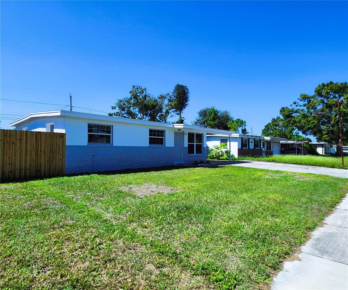 Located 8 MILES from Indian Rocks BEACH, in the unincorporated Crestridge neighborhood of Seminole.
•This RENOVATED property would make a great home for the first time homebuyer or the investor looking to rent long or short term due to its several beneficial features such as:
•NO HOA, NO FLOOD ZONE, NEW CERAMIC TILE FLOORS THROUGHOUT.
•RE-ROOF in October 2024.
•NEW ELECTRICAL wiring and panel replaced June 2025.
•NEW WINDOWS installed August 2025.
•The fully renovated kitchen includes an oversized granite countertop with enough room for bar stools, NEW STAINLESS-STEEL APPLIANCES: refrigerator, mounted microwave, electric glass-top stove and oven.
•4 Bedrooms, 2 Bathrooms: The master bedroom is a former Florida Room conversion and includes a private entry and bathroom with a fully tiled walk-in shower.
•The three renovated guest bedrooms are spacious and all include built-in closets.
•The renovated guest bathroom includes a shower and tub combination.
•There is an attached storage room that houses the electric water heater and laundry hook-up.
•The Covered Carport is large enough to fit 2-3 cars; there is also an extra parking pad providing ample space for a 3 point turn.
•Step out into your fully enclosed backyard. The homesite is approximately 62 wide by 100 deep – ample space for entertainment or to build your future pool!
•Schedule your showing today of this fabulous home that is better appreciated in person.