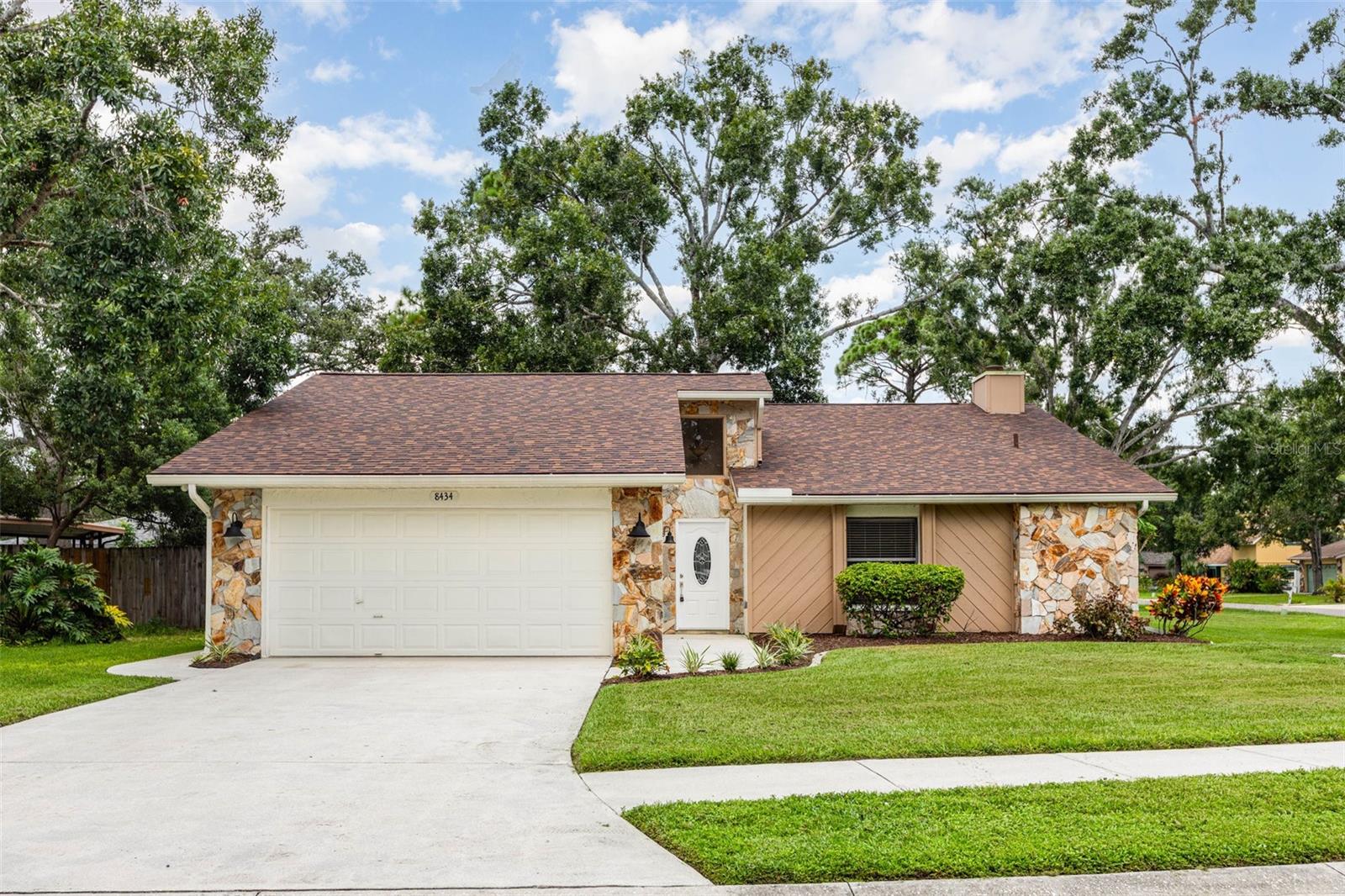 Welcome to this beautifully appointed home in the charming community of Country Oaks.
Thoughtfully designed with a desirable split floor plan, this residence blends comfort, style, and
privacy.
Step inside to discover luxury vinyl plank flooring that flows seamlessly throughout the home.
At its heart, the gourmet kitchen features stainless steel appliances and granite countertops,
opening to a living room, a family room with a cozy fireplace, and a dining area—perfectly
suited for both everyday living and entertaining.
The primary suite offers a spacious walk-in closet and walk-in shower, while two generously
sized guest bedrooms—each with its own walk-in closet—are thoughtfully positioned with a
guest bath on the opposite side of the home for added privacy.
Residents of Country Oaks enjoy low HOA fees, no CDD fees, and access to a community
pool and tennis courts. Conservatory Park is just a short stroll away, and the home’s location
offers easy access to Downtown Sarasota in only 20 minutes.
Schedule your private showing today and discover the charm, convenience, and lifestyle this
home offers.