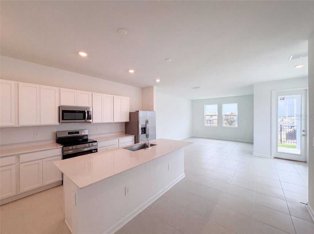 Photo of 3102 Kurtz Terrace, Davenport, FL 33837 (MLS # O6434250)