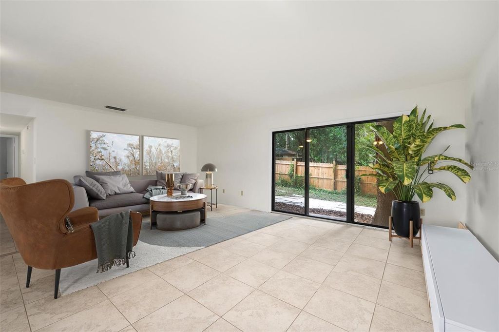 Photo of 102 NW 27th Terrace, Gainesville, FL 32607 (MLS # GC533191)