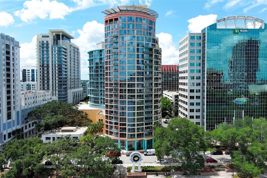 Experience elevated downtown living with stunning city views from this beautiful 11th floor condo at The Waverly on Lake Eola. This spacious 2-bedroom, 2-bathroom residence features a private balcony, sweeping floor-to-ceiling windows in the living room and primary bedroom and an open layout filled with natural light. Hardwood floors flow throughout the living areas, with ceramic tile in the kitchen and bathrooms. The kitchen has breakfast bar and stainless steel appliances.
The primary suite offers a walk-in closet and en-suite bath with vanity and a shower/tub combination. Washer and dryer are included in the laundry closet for added convenience. Two assigned parking spaces convey with the unit.

Residents enjoy premier amenities including 24-hour concierge service, a resort-style pool with cabanas and spa, outdoor grilling area, fitness center and weight room. Ideally located directly across from the iconic Lake Eola Park in the heart of downtown Orlando, with dining, entertainment, nightlife, farmers market, amphitheater, butterfly gardens, sculpture, outdoor concerts, art festivals, swan boats, paths for walking, biking or jogging and year round events.

Excellent investor opportunity with tenant already in place. Call today for your private showing!