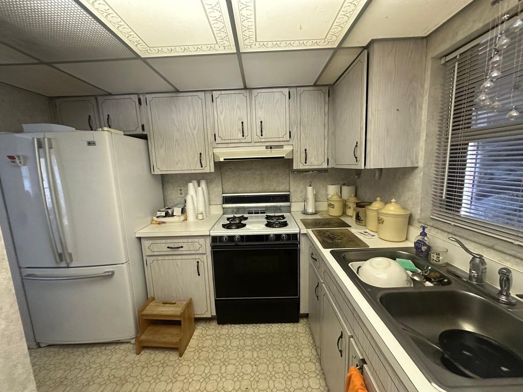 Photo of 6016 18th Street NE, St Petersburg, FL 33703 (MLS # O6352038)