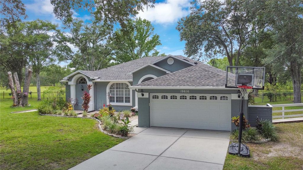 Photo of 19616 Livingston Avenue, Lutz, FL 33559 (MLS # O6354500)