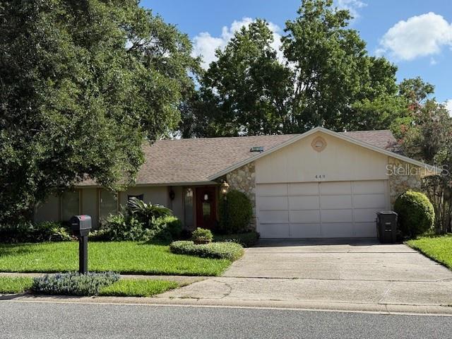 STONEWOOD. This desirable community is located in Maitland, Seminole County City limits. This four bedroom, two bath, beatiful lakefront home awaits you! Do not miss out on this wonderful opportunity. Stonewood subdivision is a beautiful area under beautiful mature oak trees with a well kept yard. The home sits high above with the view of the lake. In addition, the home has vaulted ceilings and a wood burning fireplace. Two of the rooms are walled with Pella windows looking over the lake. The kitchen and dining area are adjacent to one another and have Pella doors leading to the outside deck. The floors are a combination of carpet, large light tiles, and Bruce wood floors. This home is located near churches, schools, the Maitland Center and I4, all conviently located in Central Florida. Make this home your very own to enjoy!