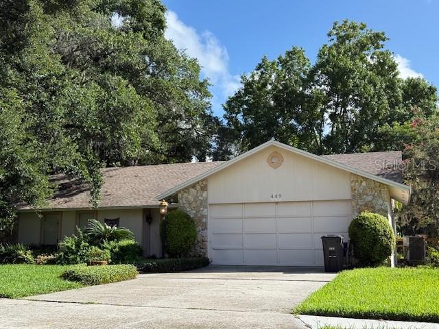 STONEWOOD. This desirable community is located in Maitland, Seminole County City limits. This four bedroom, two bath, beatiful lakefront home awaits you! Do not miss out on this wonderful opportunity. Stonewood subdivision is a beautiful area under beautiful mature oak trees with a well kept yard. The home sits high above with the view of the lake. In addition, the home has vaulted ceilings and a wood burning fireplace. Two of the rooms are walled with Pella windows looking over the lake. The kitchen and dining area are adjacent to one another and have Pella doors leading to the outside deck. The floors are a combination of carpet, large light tiles, and Bruce wood floors. This home is located near churches, schools, the Maitland Center and I4, all conviently located in Central Florida. Make this home your very own to enjoy!