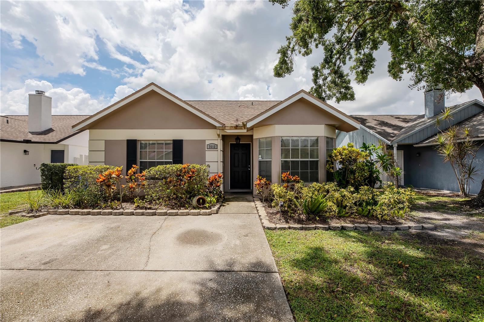 Welcome to this stunning 3-bedroom, 2-bath home located in the highly sought-after Citrus Park area of Tampa Bay! Nestled in a well-maintained community with access to a sparkling community pool, this residence offers the perfect combination of comfort, style, and Florida lifestyle convenience.
Step into a bright, open-concept living space with vaulted ceilings and elegant finishes throughout. The updated kitchen features new countertops, stainless steel appliances, and plenty of cabinet space. It has two pantries with great space for all of your kitchen gadgets — perfect for both everyday living and entertaining friends and family for Sunday football or the upcoming holiday season. A cozy breakfast nook offers a charming space to start your morning with a cup of coffee as you watch the bright sunrise. The spacious living and dining areas flow seamlessly together, leading to sliding glass doors that open up to a private backyard oasis that is the perfect blank canvas to make all of your back yard dreams come true. Whether you're enjoying a quiet evening or entertaining guests, the outdoor space is ideal for Florida living along with views of mature avocado and mango trees ripped and ready to be picked!
The split floor plan features the primary suite as a serene retreat located at the back of the home with beautiful open windows, a walk-in closet, and an en-suite bath complete with a shower/ tub combo. Two additional bedrooms located at the front of the home provide plenty of space for family, guests, or a home office. The hall bath is tastefully updated and easily accessible from the main living areas as well as the spacious laundry room.
Located just down the road from Citrus Park Elementary School and Smith Middle School. Also, just minutes from Westfield Citrus Park Mall, restaurants, and the Veterans Expressway for easy commuting and just moments from the Upper Tampa Bay Trail. Enjoy all that Tampa Bay has to offer — shopping, dining, parks, and beautiful beaches are just a short drive away! Call today to schedule your private showing before this beauty becomes someone else's dream come true!