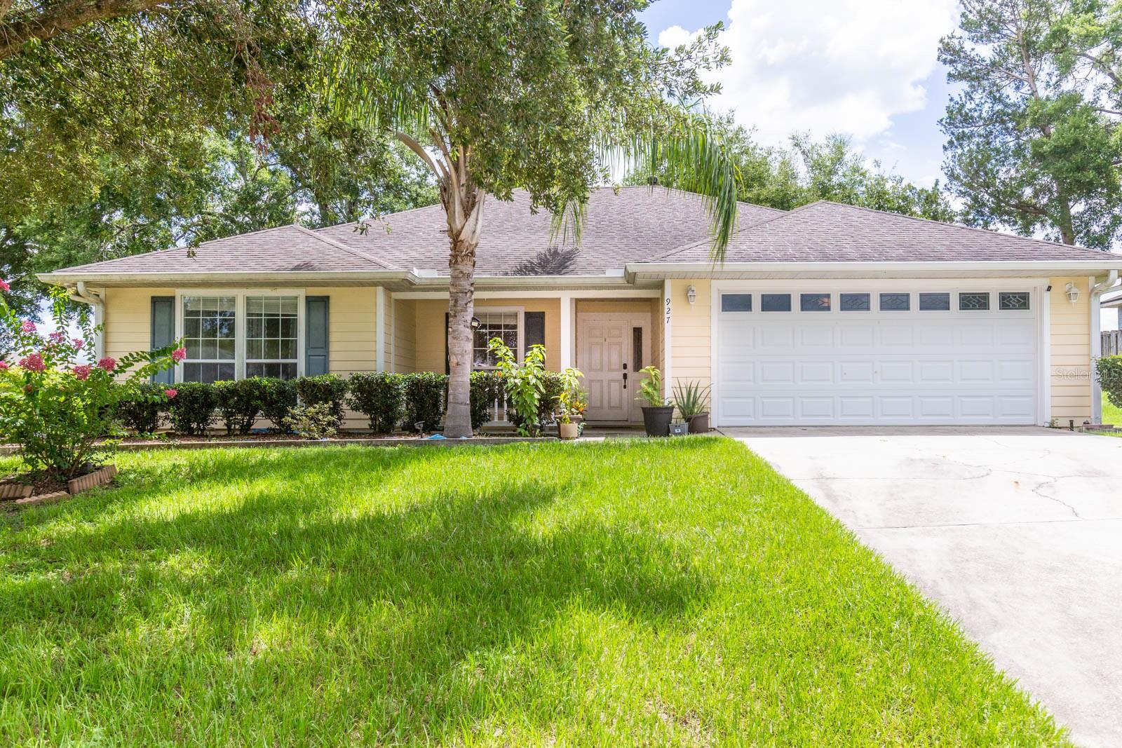 Experience the small-town charm of Newberry in the comfort of this thoughtfully designed spacious home. High ceilings and an open floorplan create an airy, welcoming atmosphere, with a cozy gas fireplace adding warmth to the living area. The bright kitchen features updated stainless steel appliances (2019), a huge pantry, convenient breakfast bar, and generous counter space, plus room for a full dining room table, making it ideal for everyday living or entertaining.
The split-bedroom layout offers privacy and flexibility, with a large owners suite that includes a walk-in closet, dual vanities, a separate shower, and a relaxing jetted tub. Two additional guest bedrooms provide plenty of space for family or visitors. The enclosed porch, fully under HVAC, adds valuable year-round living space—perfect for a home office, playroom, or quiet retreat.
Additional features include an inside laundry room, abundant storage throughout, a new HVAC system (2025), water heater (2024), a water softener (2024), hardiboard siding, mature landscaping and a fully fenced yard. This home combines room to spread out with the peaceful pace of Newberry living. Highly desirable NewTown offers basketball, tennis and a playground right in the neighborhood. You will be just minutes from Publix, Newberry Sports Complex, charming resturants in the historic dowtown, local parks, natural springs. Plus have easy access to the vibrant culture, recreation, and career opportunities of Gainesville and the surrounding area. Make an appointment for a private tour today!
