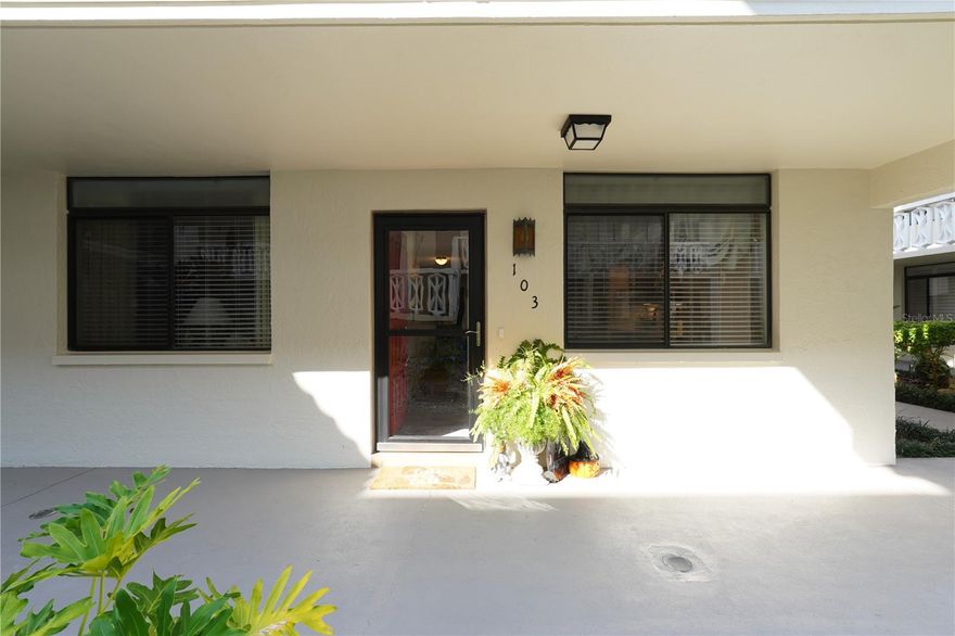 Perfection at its best!  Building 8 is a 55+ building.  This ground floor corner unit shows like a dream home.  Kitchen updated with new tile backsplash, quartz countertops and new stainless refrigerator.  The living/dining area is large enough for a full size dining table and buffet and the living room is very roomy.  Floor to ceiling sliding doors open to the stunning private patio with brick wall enclosure and wrought-iron gate.  Parking space right behind patio.  Remote control shade on the slider keeps the afternoon sun out.  Master bedroom boasts a walk-in closet and the bath vanity is updated with quartz countertop plus the tile shower has updated hardware.  Generous sized linen closet in the space outside 2nd bathroom.  2nd bedroom very roomy with large walk-in closet, and the hall bath has updated vanity and updated hardware in the tub.  New roof installed a few months ago and the Seller will pay roof assessment at closing.  Small pets are allowed, but only 1 in each unit.  Seville really has it all - centrally located to Clearwater Mall, Costco, Lowe's and many restaurants.  As you drive through the community notice the mature trees, landscaping, retaining walls, parking areas - it feels like another world.  The community boasts a Clubhouse, Exercise room, and a gorgeous heated pool with restrooms and showers.  Schedule your private tour today.