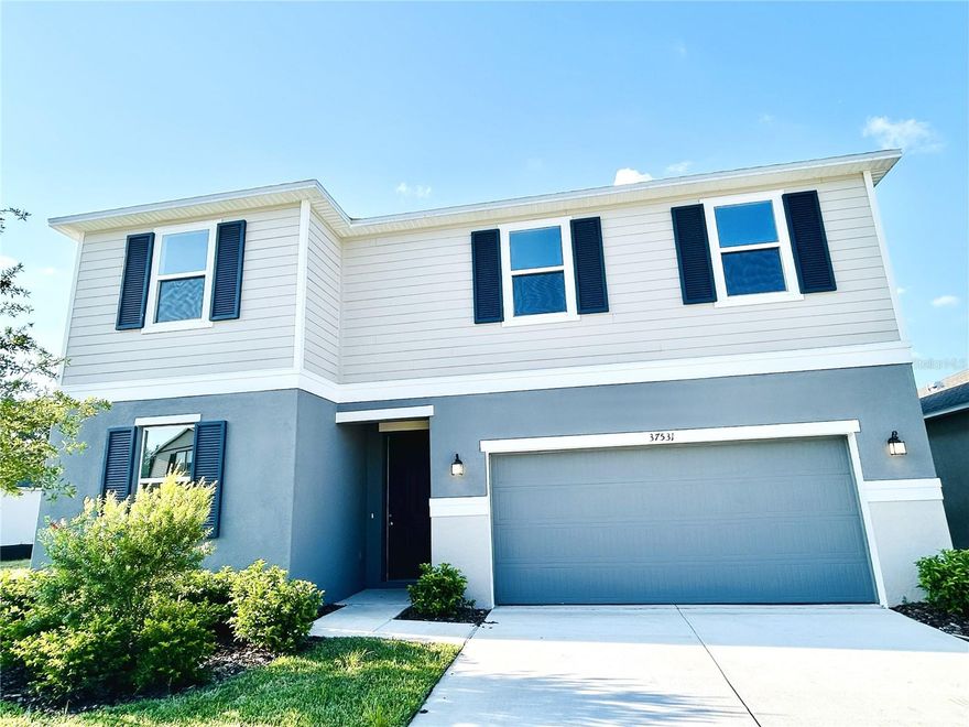 Welcome to this STUNNING and BRAND NEW Two Storied home in the desirable River Run community!! This Brand-New 5-bedroom, 3-bath home offers over 3,000+ sq. ft. of finely designed living space with its open concept layout. This flexible layout includes a first-floor bedroom and full bathroom perfect for guests or for use as home office.

Once you step inside the home you will find a flexible layout with a spacious great room, dining space, and a show-stopping kitchen. The kitchen includes a spacious walk-in pantry with shelves, stainless steel appliances, 42-in. upper cabinets, and laminate countertops. The expansive great room is well-lit by natural light from the large three-pane window and sliding glass door. Upstairs, you will find a huge loft that can be utilized as a Game/Bonus Room, a primary suite along with three additional secondary bedrooms, each with their own walk-in closet. The primary bedroom with connecting bath includes a separate jacuzzi tub, extended dual vanity sink with laminate countertop and shower with tile surround.

As you make your way through the house you will notice upgraded vinyl flooring located throughout the wet/understairs storage area(s) and new carpet installed in all bedrooms. The attached two car garage features an epoxy coated flooring for perfect durability and style. The community is located in a convenient neighborhood with easy access to US-301 and I-75 as well as proximity to Hillsborough River State Park, Shopping, Schools, Healthcare Facilities, Hospitals and more.