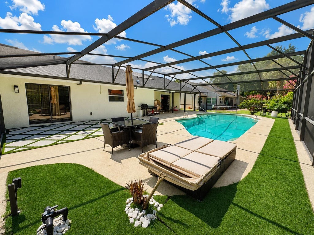 Photo of 6350 Oak Meadow Bend, Orlando, FL 32819 (MLS # O6420504)