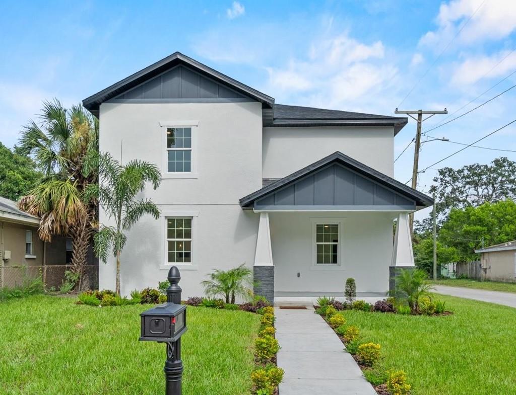 Luxury new construction in Tampa’s hottest growth area! This stunning 4-bedroom, 3.5-bath home offers nearly 3,000 sq. ft. of living space with dual master suites, Calacatta quartz countertops, Samsung appliances, and designer finishes throughout. The open-concept layout features a waterfall island kitchen, spacious living and dining areas with 24x48” porcelain tile, and an upstairs loft with luxury vinyl plank flooring. Enjoy spa-like baths with oversized showers and a freestanding tub. The exterior boasts lush landscaping, a 2-car garage, covered porches, and a large backyard—perfect for entertaining. Conveniently located near Downtown Tampa, Ybor City, and major highways. Builder warranty included