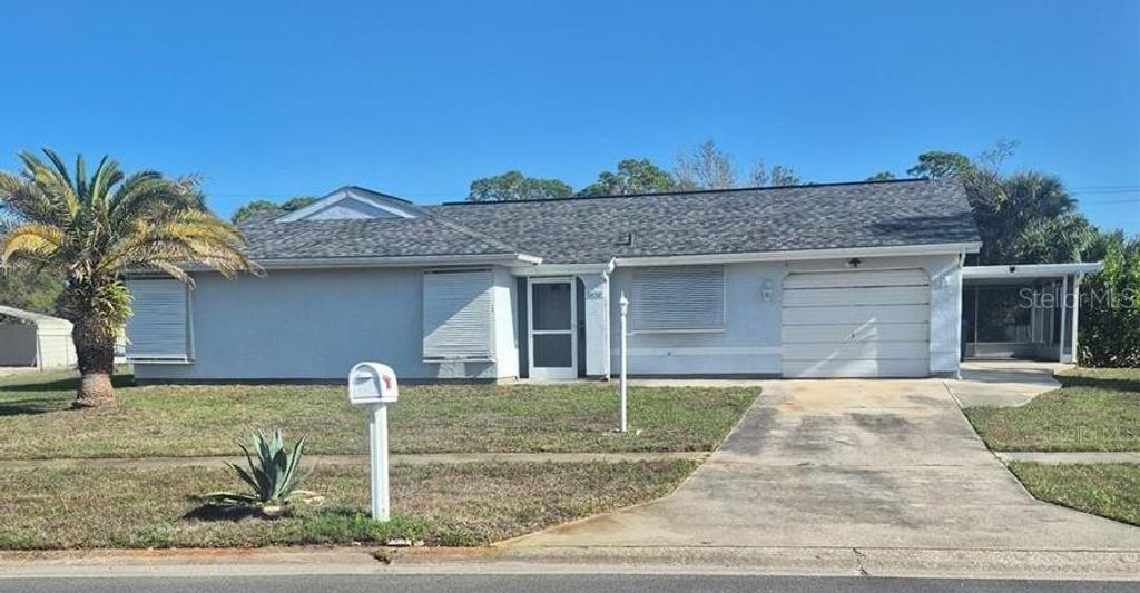 Photo of 5858 Kenwood Drive, North Port, FL 34287 (MLS # C7523021)