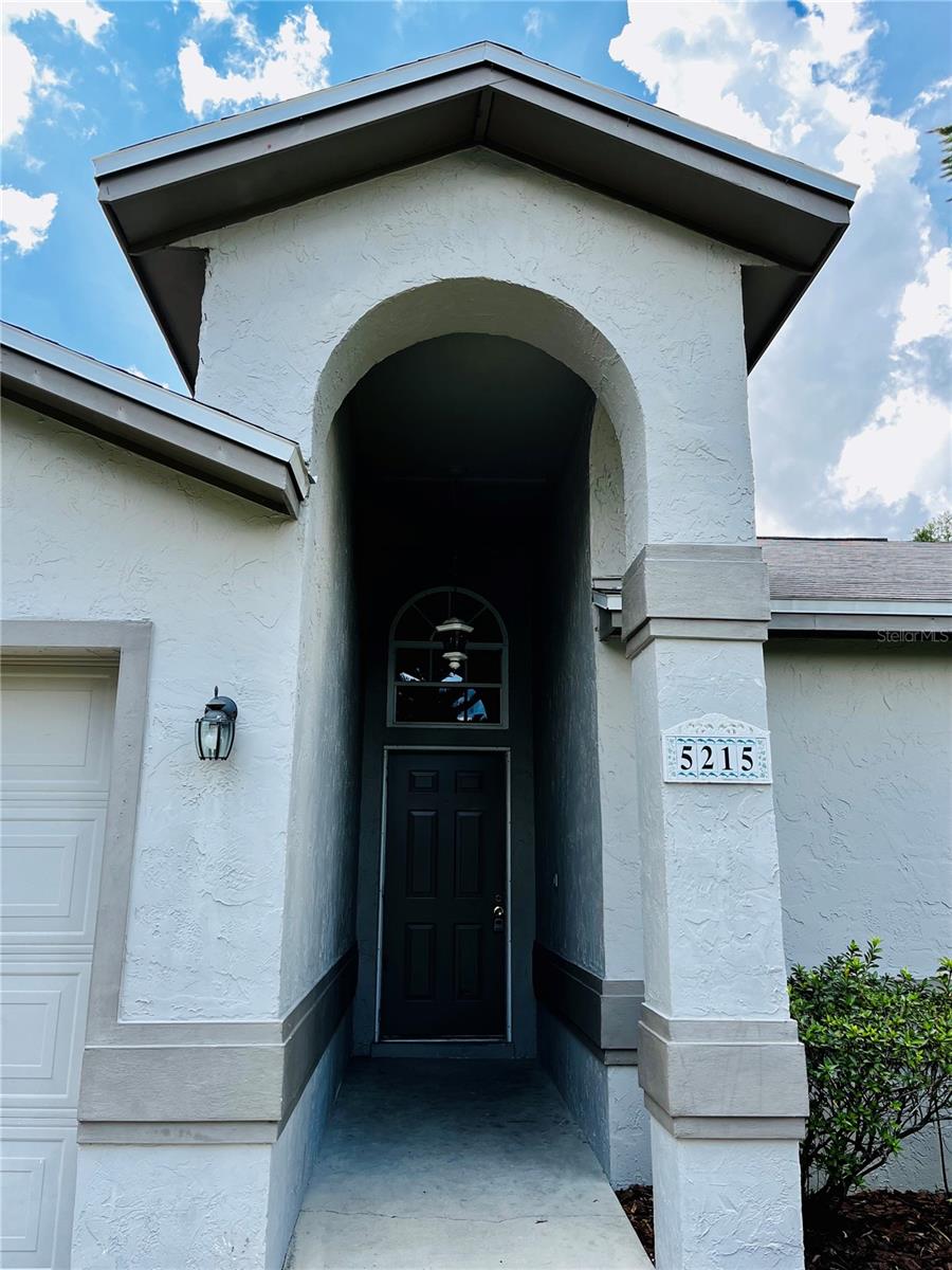 Adorable 3 bedroom and 2 full bathroom home with large yard, screend patio, fireplace, and newer floors and paint available for rent beginning 10/1/2025 in Island Walk! Located next to Banana Lake Park with its public boat ramp. Call today to learn more!