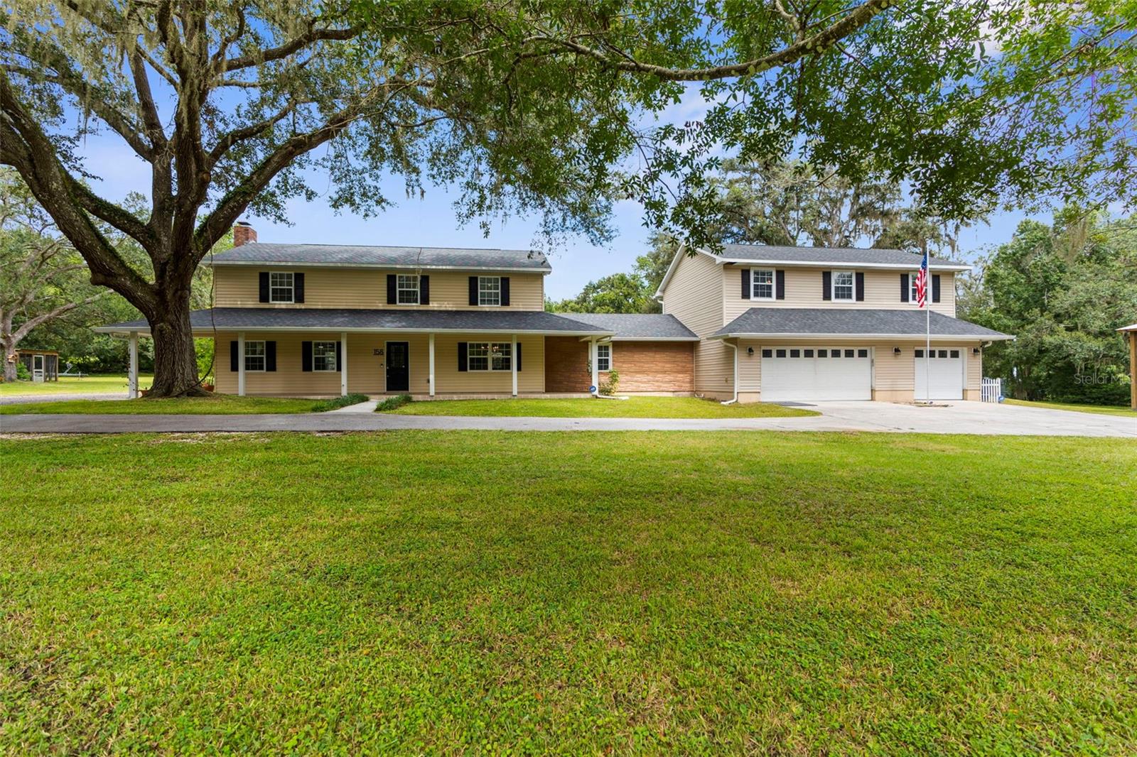 Acreage just minutes from the hustle and bustle of Downtown Brooksville...You have GOT to check this property out! This immaculate home is situated on a beautifully maintained 2.4 acres and boasts 4-bedrooms, 3.5 bathrooms, several outbuildings, tons of parking options, an incredible outdoor space, and we're just getting started. Upon arrival to this stunning contemporary farmhouse, two automated gates welcome your guests to the main driveway. An expansive front porch that frames the front of the home, perfect for rocking chairs and coffee sipping under the oak trees. Come on in to find a large living room off to the left with wood burning fireplace and several newly upgraded windows with a 360* view of the property. Continue around to find a breakfast nook and newly redesigned kitchen. Complete with top tier quartz countertops, clean backsplash and new hardware throughout. A breakfast bar separates the kitchen from a formal dining space, again with large picture window for more sunshine. Heading upstairs you'll find three of the four bedrooms, all with expansive walk-in closets, new carpeting, and flooded with natural light. A full tub/shower combo sits in the hall bathroom with travertine tile throughout. Continuing down the hall, past several storage closets, sits one of the primary suites, complete with ensuite with travertine shower, and not one but two walk in closets. Heading back down to the main level, and just past the beautiful kitchen, sits an upgraded half bathroom with outdoor access to the pool area. A second family room or living space is just past the very large laundry room and allows for a multi-use space. Continuing on through the home, another access point to the expansive backyard, as well as garage access to the 3-car garage. with ample storage. Making your way up a second set of stairs takes you to a third, yes, a third, living space, family room, etc. With an attached second primary suite, huge walk-in closet, and ensuite. This bathroom is massive with garden tub, shower and vanity. This set up would be ideal for multigenerational living, older child, etc. The possibilities are endless! Now for the fun...The newly refinished pool is surrounded by a large, paved area with ample room for decorative seating and entertainment. A large pole barn is situated just beyond the pool, outfitted with a bar, sink and refrigerator. All with full power. Outdoor fans move air while watching the game on the tv poolside! Possibilities are endless. On the property itself, several outbuildings, 2-sheds with power, a 48x48 pole barn set on 8x8 posts, a large chicken coop, and a bunny hutch. This home truly has it all, and all within minutes of Downtown Brooksville has to offer. Perfectly situated in between all three zoned schools and just a stone's throw away from major highways. Best part...Seller is offering up to 3% towards buyer's costs or rate buydown with the use of our preferred lender! In this market...that's HUGE! So, call today to schedule your showing-can't wait to welcome you home!