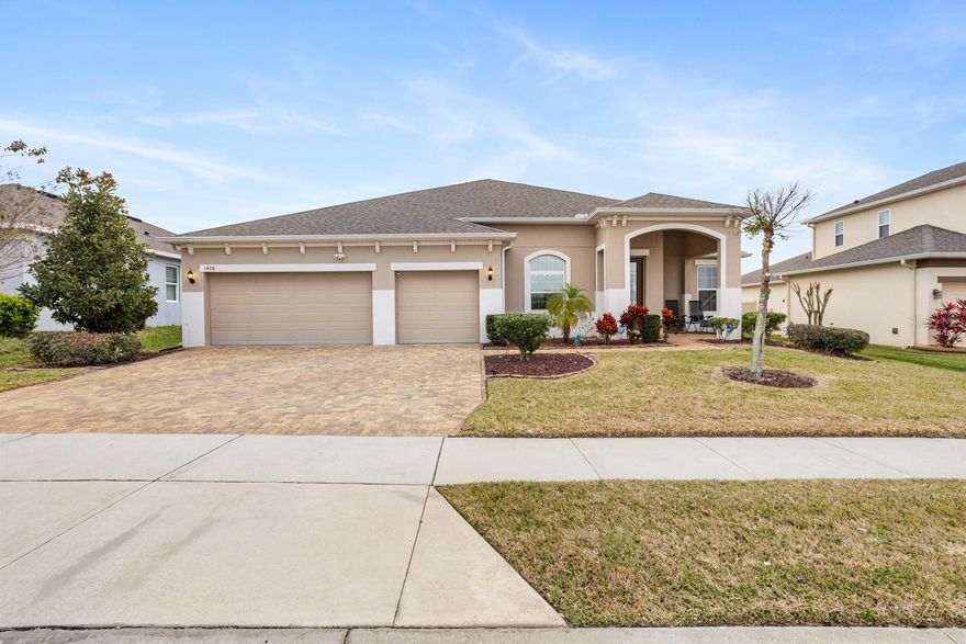 Welcome home to this beautifully upgraded 2,772 sq ft Brentwood model located in the highly sought-after Ardmore Reserve community of Minneola. Built in 2019, this stunning 4-bedroom, 3-bath home with a 3-car garage shows like a model and offers exceptional upgrades throughout. Tile flooring runs throughout the entire home and is complemented by 8-foot doors, enhancing the home’s open and grand feel. The gourmet kitchen is a chef’s dream, featuring an oversized island with breakfast bar seating for five, pendant lighting, granite countertops, tiled backsplash, gas cooktop, and built-in oven and microwave—perfect for entertaining. The spacious family room boasts an impressive 11-foot tray ceiling, adding to the light and airy ambiance. The oversized primary suite offers a luxurious retreat with an elegant en-suite bath, including a separate garden tub, large frameless glass shower with rainfall and main showerheads with touch panel controls, a private water closet, and a generous walk-in closet. Bedrooms, three and four also feature walk-in closets, providing ample storage and flexibility for family or guests. Enjoy Florida living year-round in the fully fenced backyard featuring fruit trees and a large covered lanai with an extended covered area—ideal for outdoor entertaining with privacy in mind. Additional highlights include whole-house water treatment, surround sound prewire, and a full-size 3-car garage with epoxy flooring, high ceilings, and ample overhead storage racks. Ardmore Reserve offers resort-style amenities including a community pool, sun deck, veranda, and shaded playground—and no CDD fees. Conveniently located near the Florida Turnpike, the community provides easy access to Disney and area attractions (approx. 30 minutes), Orlando International Airport (approx. 40 minutes), downtown Clermont and Winter Garden, shopping, dining, golf courses, trails, the National Training Center, and major retailers such as Costco, Publix, Target, and Home Depot. The new AdventHealth Minneola Hospital, medical offices, VA facilities, and top-rated schools including Minneola Charter School are just minutes away. Come experience this exceptional home and enjoy all the conveniences Minneola has to offer.