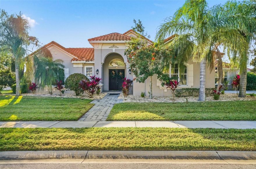 One of the largest courtyard homes located in the gated community of Toscana. This lakefront home is on an oversized lot, faceing west for beautiful sunsets. Enter the courtyard doors to the travertine decked and screened pool, spa and fire bowls. Separate pool room with full bath, functional for office, guest room, in-law suite. Large L shaped summer kitchen plumbed with propane gas. Entering the main home, large pocket doors in the family room and sliders in primary bedroom all open to the courtyard. Primary bedroom, guest room, family room, formal living and dining rooms all on the first floor. Large loft area with stunning views has a separte full bath. Home has three car garage, paver driveway and walkway. Community features entry gate, playground, underground utilities. This community at completion will have just over 200 homes. Schedule your showing today!