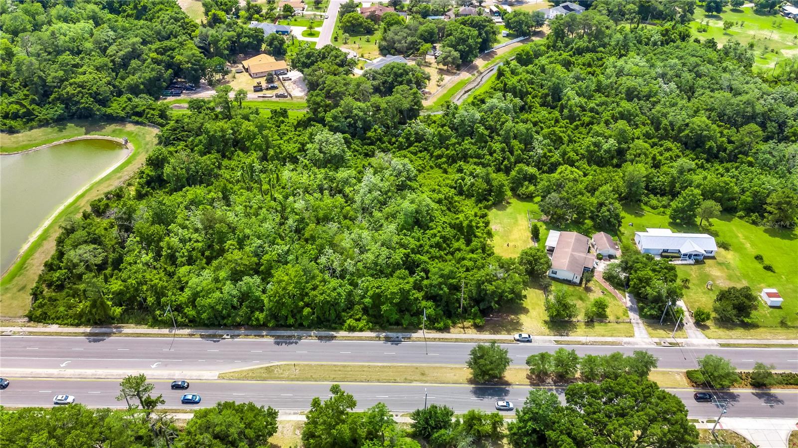 New Price...Property is 4.55 Acres. A lot of options with this property. Some land is cleared and timber/woods on most of it. Location is directly on Hiawassee with about 510 ft. of frontage to a four lane road (Hiawassee). Less than 1/2 mile south of 441/Orange Blossom Trail and is .3 miles from Highway 414. Zoned A-1. There is a lot of development taking place in this area. Location is excellent. Check Orange County Records and MLS attachments for additional information.