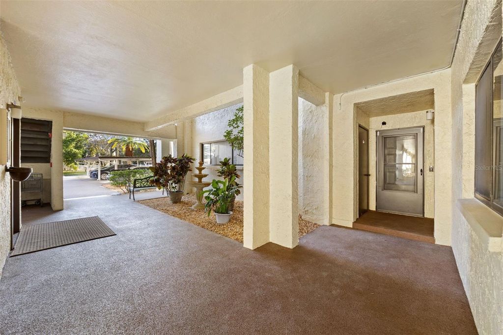 Photo of 700 Starkey Road #312, Largo, FL 33771 (MLS # TB8458514)