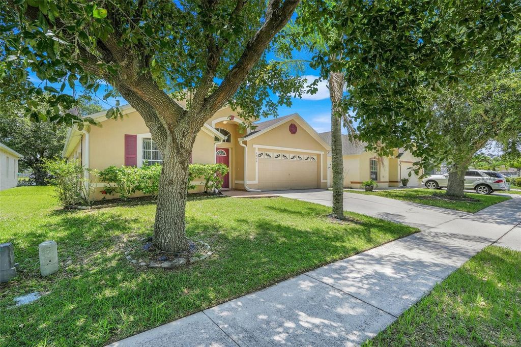 Photo of 7720 Hidden Cypress Drive, Orlando, FL 32822 (MLS # O6364474)