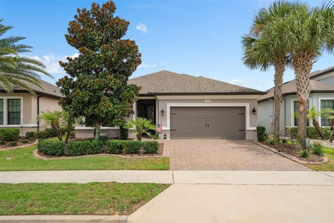 Photo of 1389 Zeek Ridge Street, Clermont, FL 34715 (MLS # O6422419)