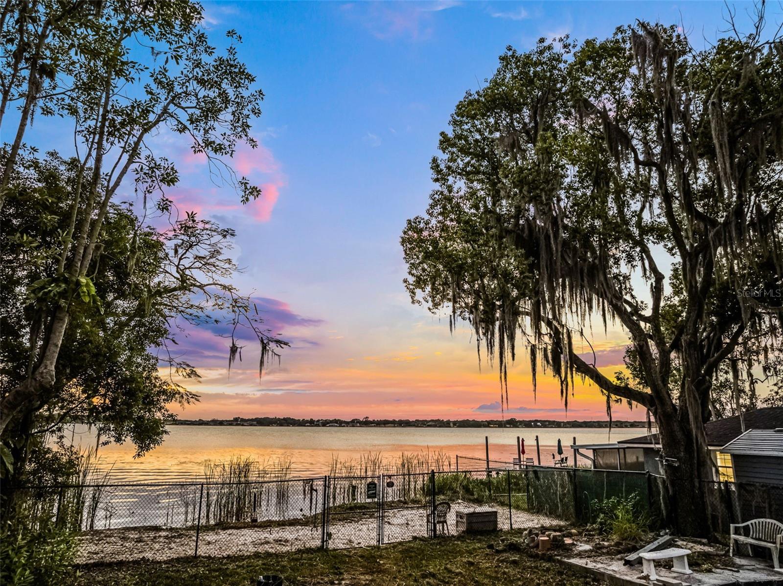 Amazing Lake Views and Endless Possibilities!
This rare double lakefront lot offers direct access to beautiful Lake Mariana with stunning panoramic water views — the perfect setting for your forever home or vacation escape.
Nestled in a quiet, well-maintained neighborhood, this property is ideal for avid fishing enthusiasts and boating lovers. Spend your days relaxing on the water and your evenings enjoying breathtaking sunsets from your backyard.
Located just minutes from I-4, you'll have quick and easy access to Disney, Orlando attractions, shopping, dining, golf courses, hospitals, and airports in nearby Winter Haven — all while enjoying peaceful lakefront living with no HOA restrictions.
Key Features:
Double lot with prime lake frontage
Storage shed and black chain link fence already in place
Magnificent, unobstructed lake views
Perfect for fishing, boating, or simply relaxing
Build your single-family residence with no time frame to build
Quiet, friendly neighborhood
Easy access to I-4, Disney, Orlando, Tampa, and more
Don't miss this incredible opportunity to live the ultimate lake life! Build your dream Florida home in a location close to everything — and start every day with a spectacular view.
Schedule your showing today and see the beauty of Lake Mariana for yourself!