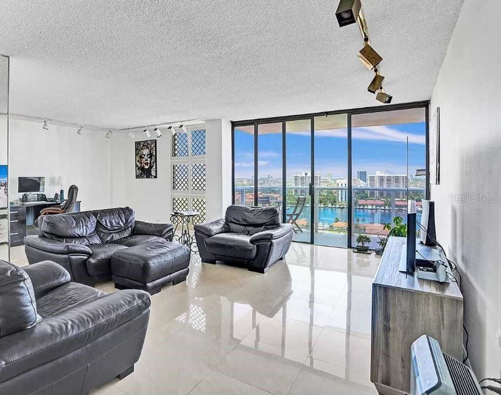 Photo of 3675 N Country Club Drive #2110, Miami, FL 33180 (MLS # FC313295)
