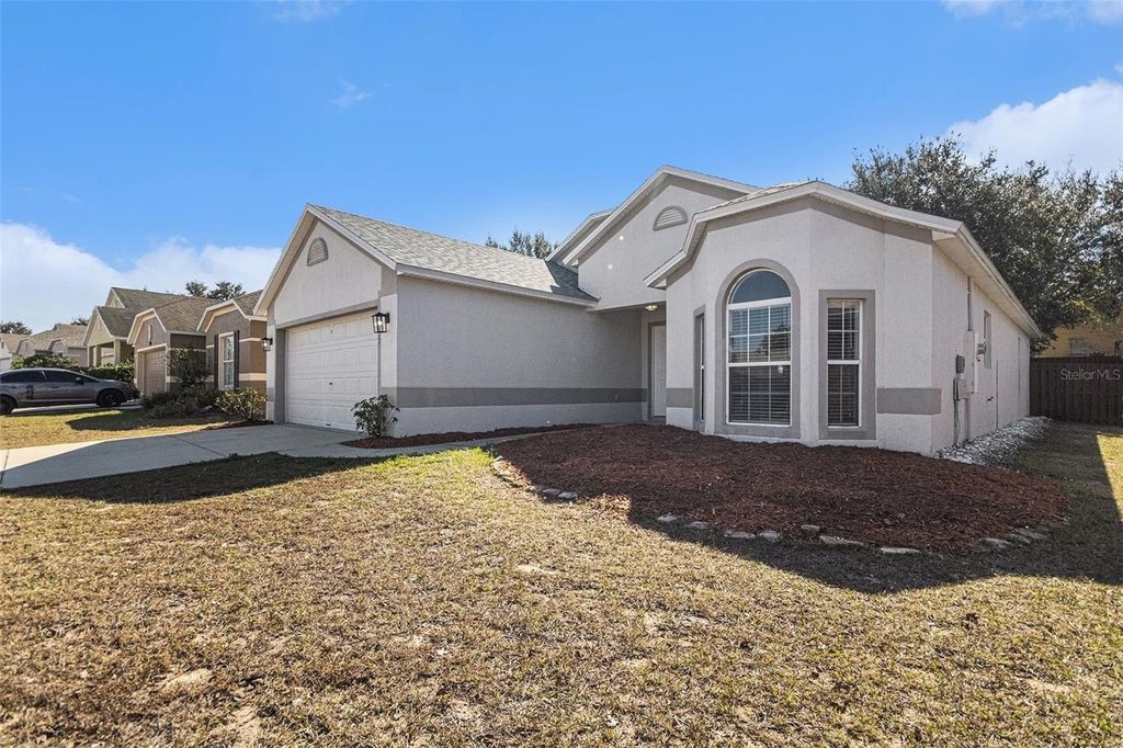Photo of 1072 Bluegrass Drive, Groveland, FL 34736 (MLS # O6378409)