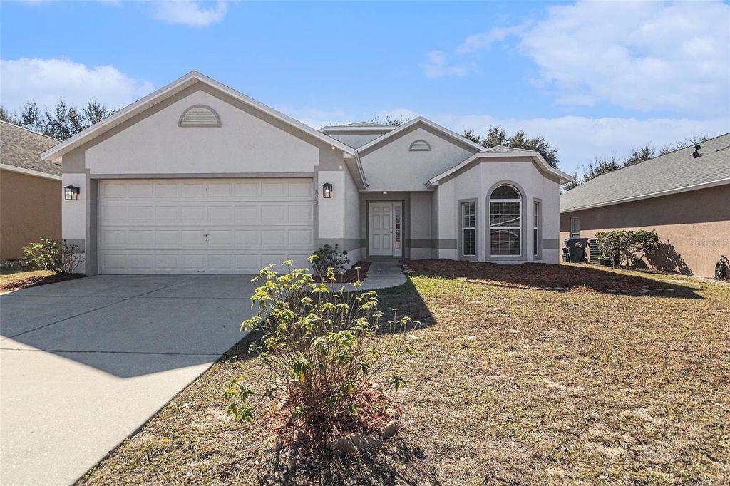 Photo of 1072 Bluegrass Drive, Groveland, FL 34736 (MLS # O6378409)