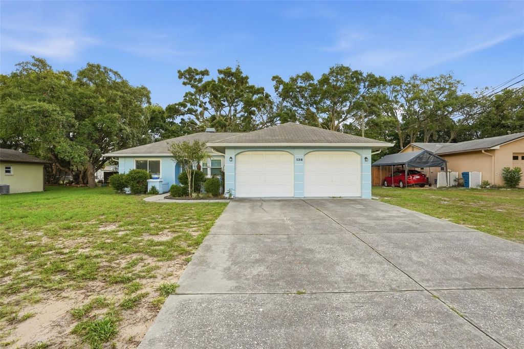 Photo of 136 Waterfall Drive, Spring Hill, FL 34608 (MLS # TB8510487)