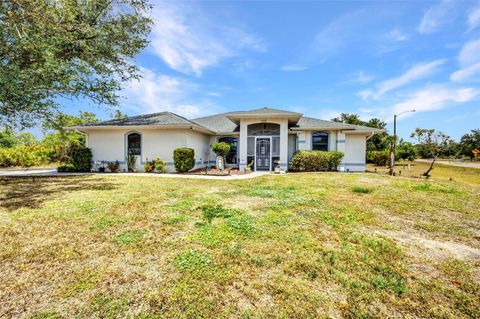 Photo of 17210 Chase Avenue, Port Charlotte, FL 33948 (MLS # C7509443)