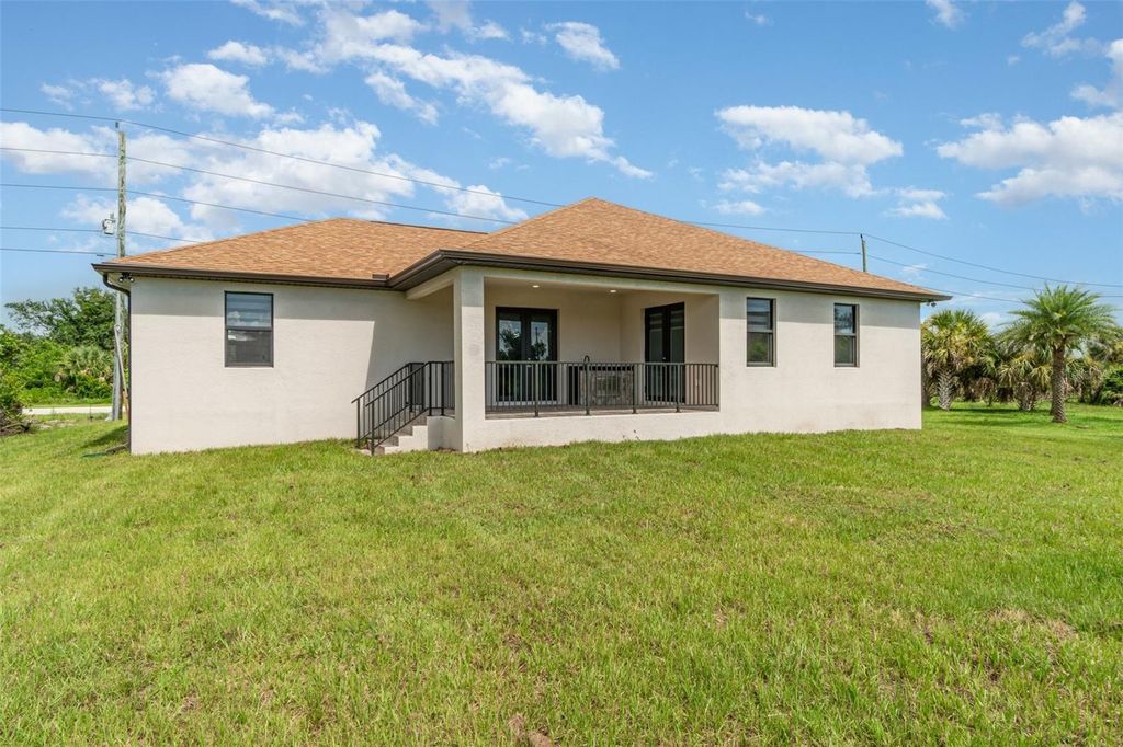 Photo of 10269 Calumet Boulevard, Port Charlotte, FL 33981 (MLS # TB8416726)