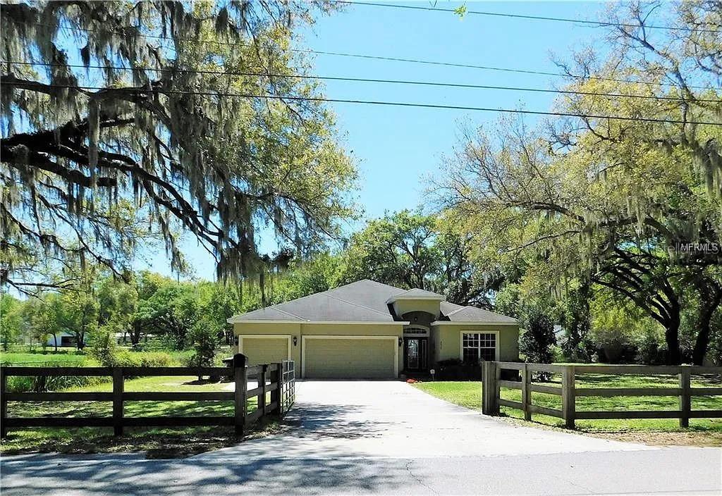RENTAL OPPORTUNITY AT GREAT LOCATION!!!!
Spacious 4 Bedroom+Office, 3 Bath Pool Home Located in Desirable South Lakeland on 3/4 acres with NO HOA. There's plenty of room for everyone, a garden, & much more! This beautiful property is fenced, gated (3) remotes, & offers a metal building on a slab with electricity. Convenient, separate gated entrance for your boat, work truck, or RV. Interior offers triple split floor plan, open kitchen with stainless steel appliances, closet pantry, and breakfast bar. Vinyl wood floors in large dining & living area perfect & inviting for large gatherings. Master bedroom includes high ceilings, sliding doors, & overlooks the salt water pool & huge private back yard. Master bath includes dual sinks, soaking tub, seperate shower, & large walk-in closet. Split rail fence adds a perfect touch! Close access to restaurants, grocery, and parkway. Looking for extra room for your stuff? Extra storage/work space at the backside. This place is perfect! Call today for your showing! First and last month Security deposit is required with first month rent on ready to move in date.