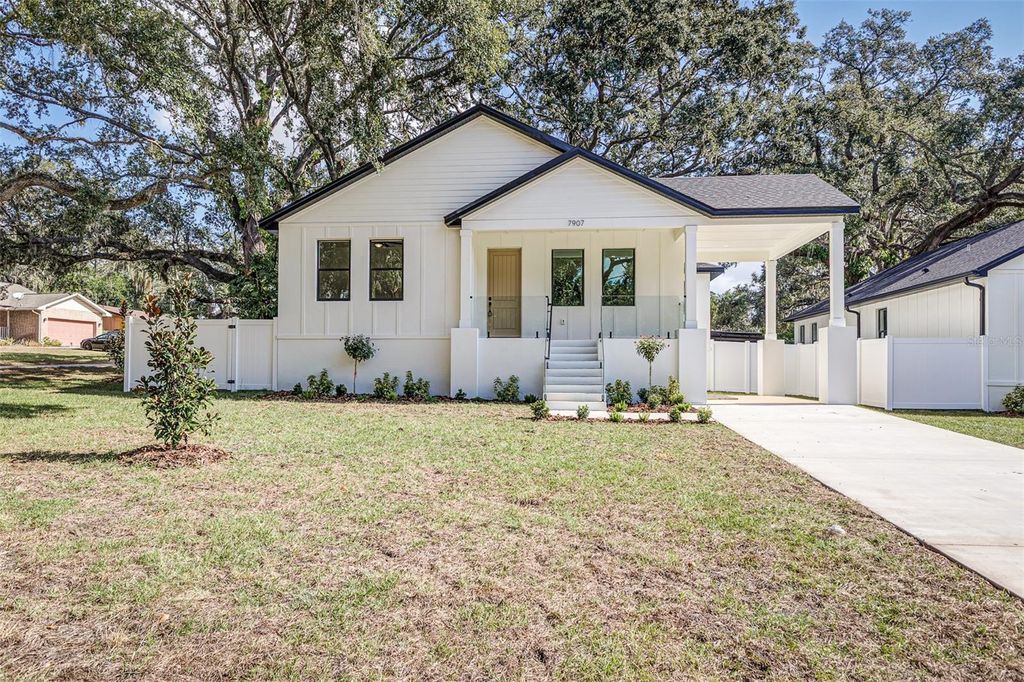 Photo of 7907 N Greenwood Avenue, Tampa, FL 33604 (MLS # TB8463319)