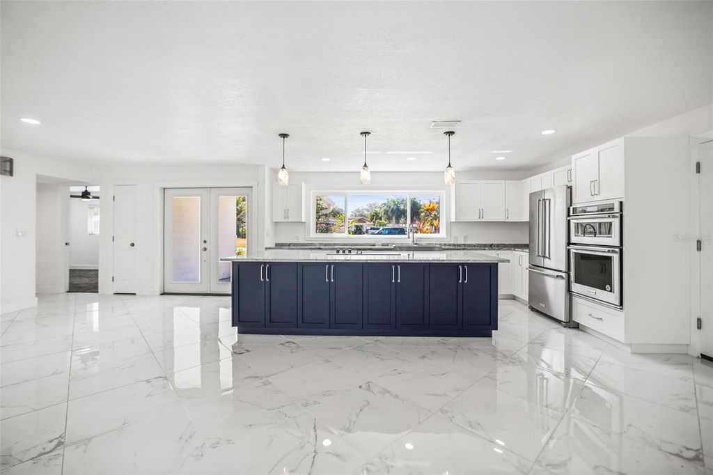 Photo of 1042 Idlewild Drive N, Dunedin, FL 34698 (MLS # TB8477858)