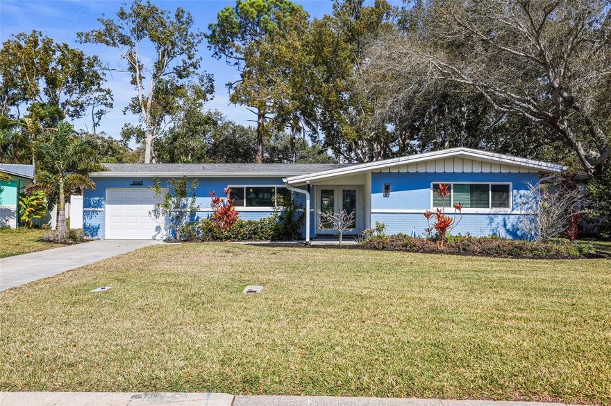 Welcome to Dunedin’s coveted golf-cart-friendly lifestyle — with 70 acres of Highlander Park as your backyard and the Hammock Park entrance just a few homes away.

Perfectly positioned in the vibrant heart of this beloved coastal community, this beautifully remodeled home offers the best of both worlds: peaceful park-side living and effortless access to Downtown Dunedin’s restaurants, pubs, waterfront parks, and charming boutiques — all easily reached by golf cart or bike.

Step inside to a spacious, open-concept floor plan highlighted by elegant ceramic tile flooring throughout the main living areas, creating a seamless, airy flow ideal for entertaining. The thoughtfully designed kitchen features custom cabinetry, sleek granite countertops, and premium stainless-steel appliances — blending style and functionality with ease.

Comfort continues in the bedrooms with plush carpeting underfoot, while the updated bathrooms offer a modern, spa-inspired feel. Major improvements completed in 2022 include a new roof, upgraded A/C system and ductwork, energy-efficient windows, and a full sprinkler system — providing peace of mind for years to come.

What truly sets this home apart is its extraordinary setting. The rear of the property opens directly to 70-acre Highlander Park, delivering unobstructed green-space views, exceptional privacy, and the rare feeling of having no rear neighbors — just nature, trails, and open sky. With the Hammock Park trailhead only a few houses away, outdoor adventure is literally at your doorstep.

The Dunedin Community Center is just around the corner, offering year-round programs and activities that reflect the welcoming spirit of this charming coastal town.

A remodeled home with major updates, golf-cart convenience, park-backed privacy, and a prime Dunedin location — this is Florida living at its finest. Schedule your showing today!