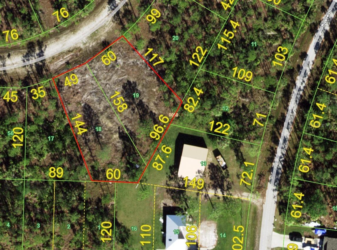 Nestled in the serene community of Tropical Gulf Acres, this expansive 19,889 sq ft lot (109x182') offers a rare opportunity to create your dream home in a peaceful, rural setting. Spread across two spacious lots in a No Scrub Jay Zone, this property provides ample space and privacy, free from HOA restrictions or deed limitations—giving you the freedom to build exactly the way you envision. Enjoy the tranquility of country living while remaining conveniently close to key amenities. This prime location is just minutes from Punta Gorda Airport, I-75, shopping, dining, and the breathtaking Gulf Coast beaches. Plus, with no flood zone concerns, you can plan your build with confidence. Whether you're looking to invest or craft your ideal retreat, this property offers the perfect combination of location, space, and potential. Seize this incredible opportunity today!
