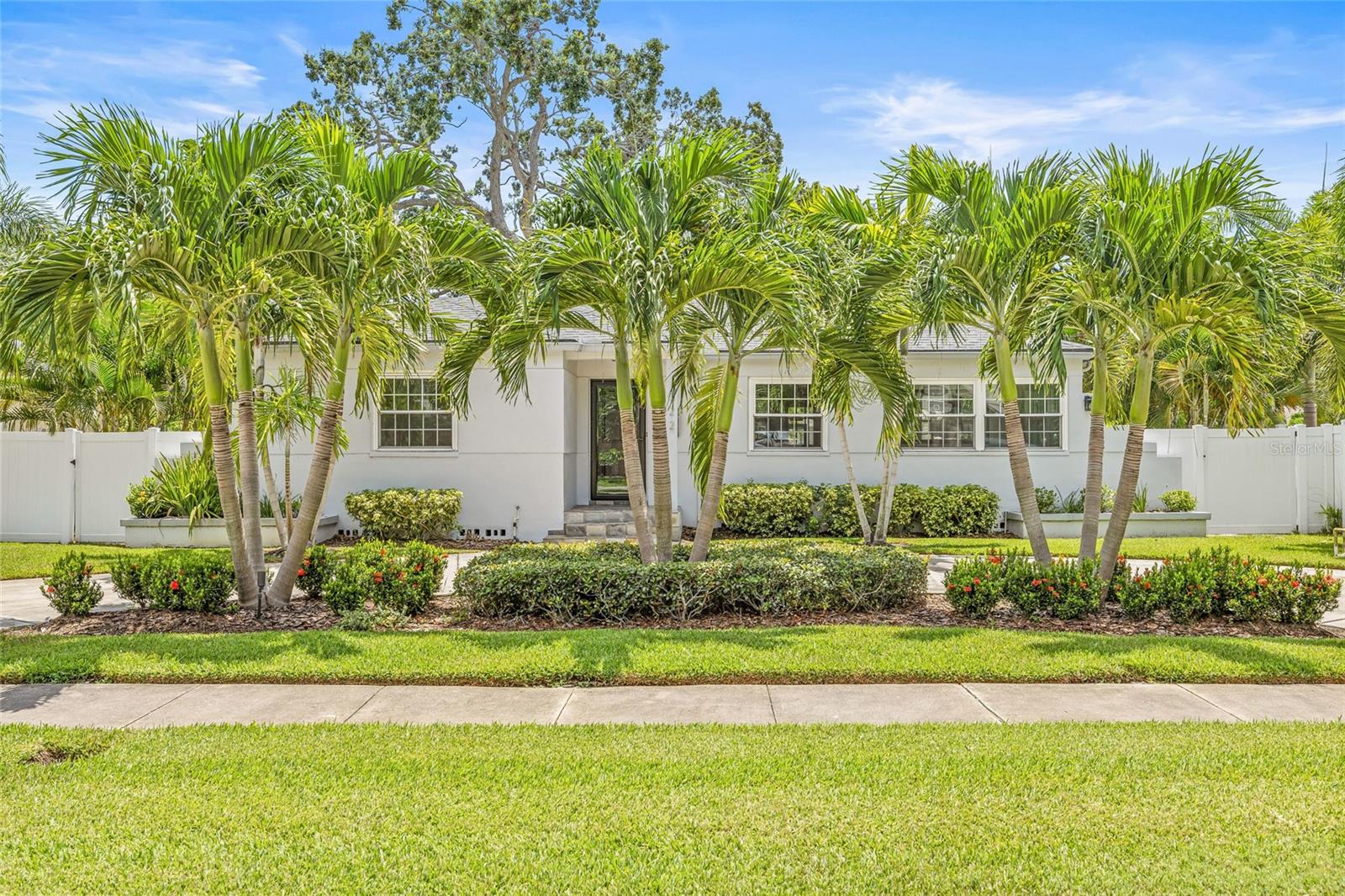 One or more photo(s) has been virtually staged. Now Listed at $605,000! Located in one of St. Pete’s most beloved neighborhoods, Coffee Pot Bayou, this updated 3-bedroom, 2-bath block home sits on an oversized lot with alley access and offers a rare mix of character, space, and move-in-ready updates. Inside, you'll find new hardwood floors (2025), a fully renovated kitchen with custom cabinetry, granite counters, subway tile, stainless appliances, and a wine fridge. The split floor plan includes a large primary suite with updated bath and walk-in shower, two additional bedrooms, and another full bath. A spacious screened patio opens to a beautifully landscaped backyard framed by mature palms and a grand live oak, plus a storage shed and parking pad for your boat or trailer. Additional upgrades include a new A/C (2023), Hunter Douglas window treatments, vinyl fencing, and a tankless water heater. Just blocks from Crisp Park’s boat ramps and playgrounds, and an easy walk to Publix, Whole Foods, Trader Joe’s, and local shopping and dining. Minutes to downtown, top-rated schools, the 4th Street corridor, and Gulf beaches, this home offers the ideal blend of location, lifestyle, and value in one of St. Pete’s most walkable, water-accessible neighborhoods. No flood damage from Helene or Milton.