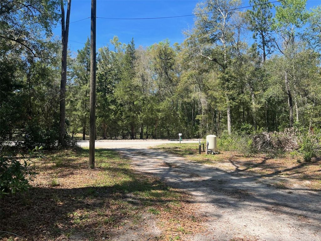 Photo of 10304 NW 25th Court, Branford, FL 32008 (MLS # GC538287)