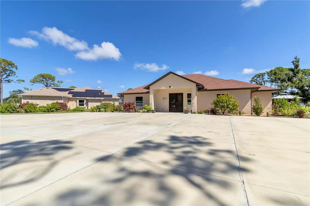 Photo of 1991 Heasley Road, Englewood, FL 34223 (MLS # TB8536146)