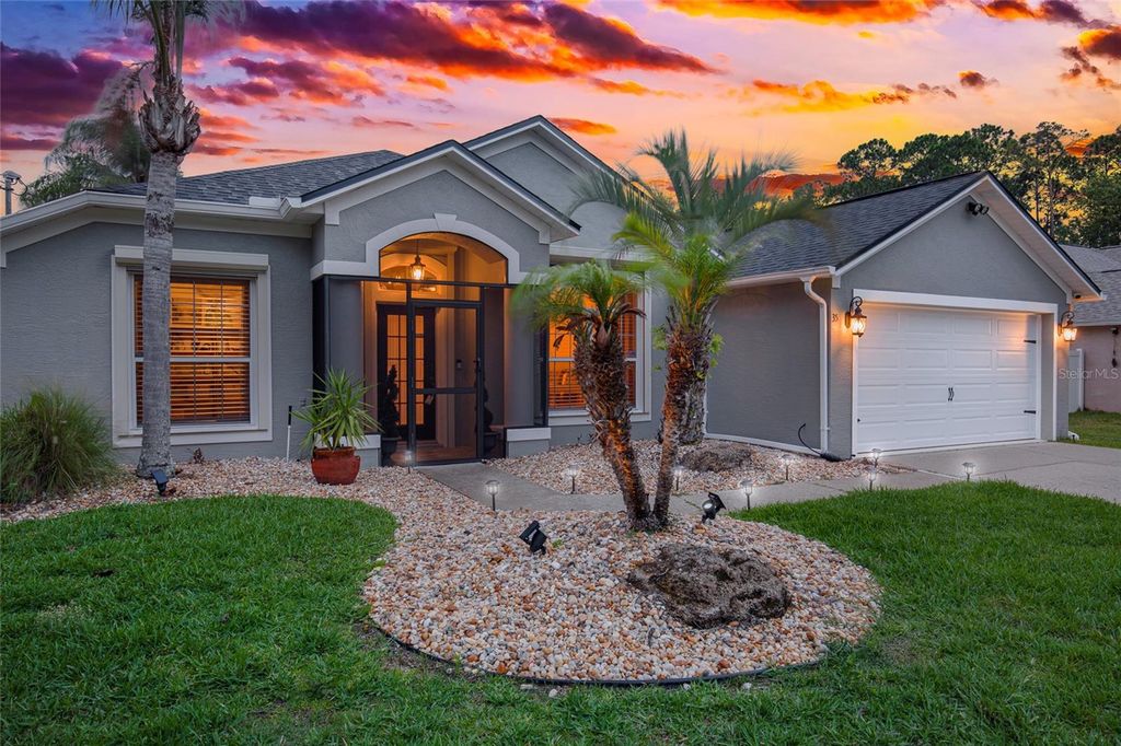 Photo of 35 Burning Ember Lane, Palm Coast, FL 32137 (MLS # FC318780)