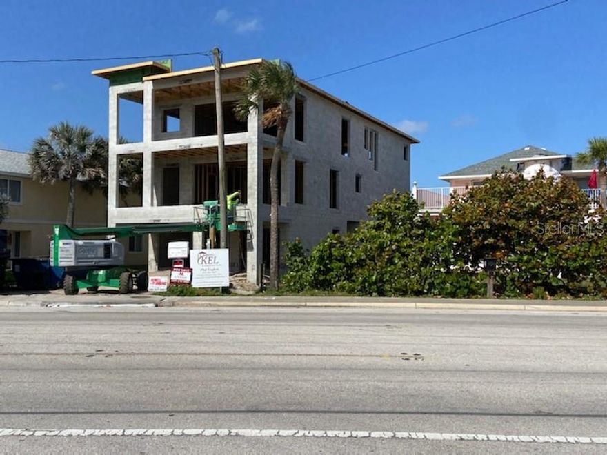 Move in November 2022! Unobstructed ocean view luxury three story 5 bedroom 5 1/2 bath dream home a few blocks south of Flagler Ave. Four bedrooms on the second and third floors with ensuite bathrooms. Huge master and family room have ocean views and separate 300 sq ft balconies. In-law suite is on the first floor connects to the rest of the home through the three story elevator or stairs. High end appliances and marble ceramic finishes. Professionally designed home. A 3 1/2 car garage and two separate entrances to the main home and in-law suite. Located in the short term nightly rental area. Plenty of room in the backyard for an outdoor pool/spa/summer kitchen. There's a huge rooftop deck with 360 degree views of the ocean, sunrises and sunsets. At CO for the home, price will increase by $100,000.00. Finishes include: Gourmet chef's kitchen, custom white oak shaker cabinets, GE monogram appliances, marble and ceramic flooring, sonos surround sound, shiplap details, custom light and plumbing fixtures, gas plumbing and water for hot tub on roof top crows nest and prewired for electric car charging. ;Water: City