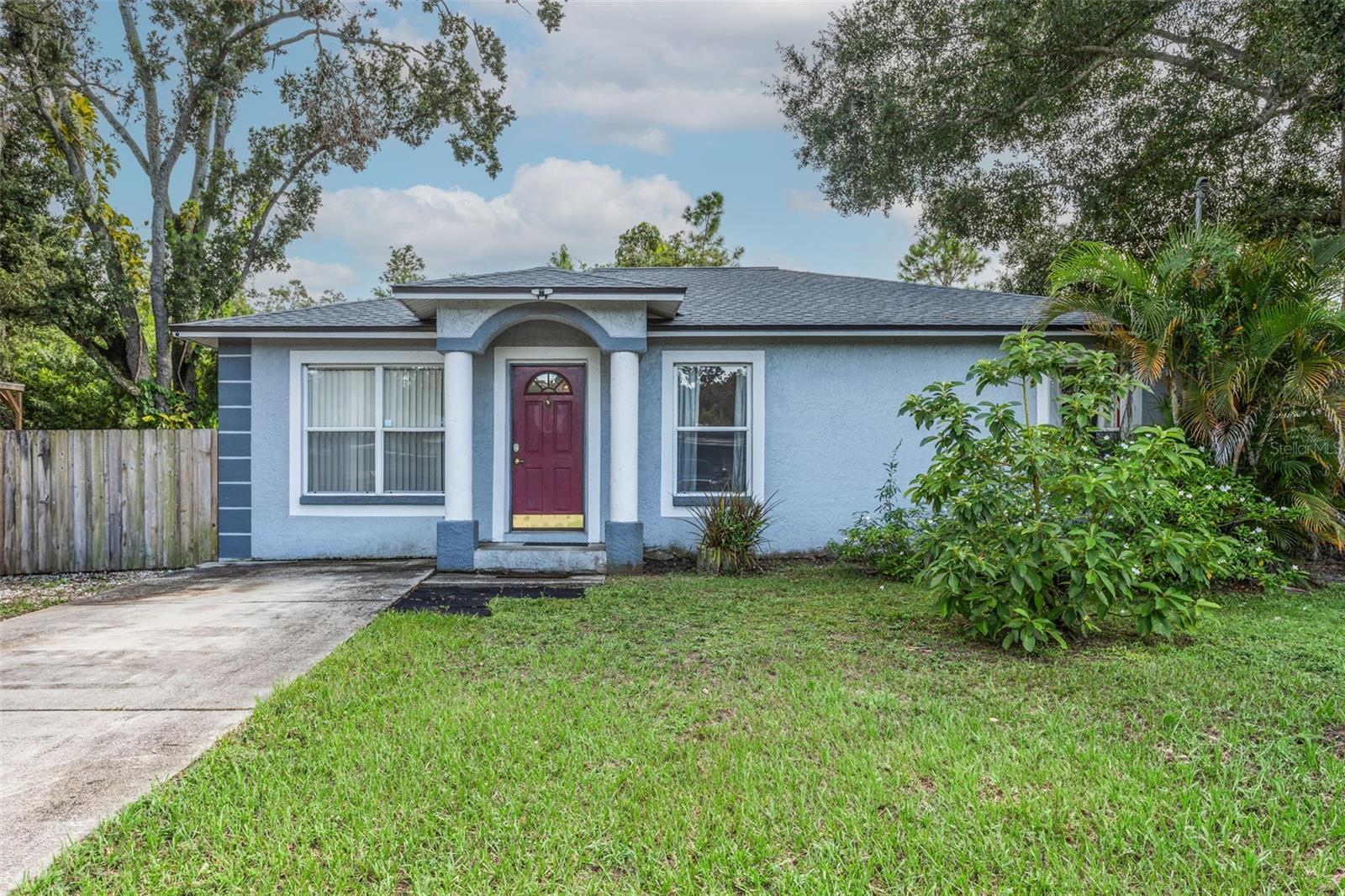Amazing Opportunity! The Perfect Place To Call Home! Property is on a huge fenced-in double corner lot with carport! NO CDD FEE & NO HOA! This home will go quick! HOME FEATURES a fantastic open floor plan, 1,200 sq ft of great living space with 3 bedrooms, 2 baths & carport. Home is perfect for entertaining! Spacious open floor plan home, dining room, living room, tile flooring. Open kitchen with plenty of cabinet space, appliances, range, microwave, dishwasher, oversized basin sink, breakfast bar. Large master with Master bath with vanity area & walk-in shower. Off the dining room leads out to the patio with an oversized private fenced backyard perfect to relax, BBQ’s, entertain, outside dining or hang out with friends & family! THE LARGE WIDE FENCED-IN BACKYARD YOU CAN EASILY ADD A POOL, HOT TUB, PLAYGROUND AS MOST OF THE OTHER HOMES YARD SPACE ARE TOO NARROW. For you dog lovers the large backyard is great space for dogs to safely run around unleashed & just install a doggie door and no more getting up early for morning walks! Also there is a gate so you can park your RV, Boat, trailer, etc! Are you ready to have your imagination run wild with the endless possibilities??? Roof 2022, Great location, close to all shopping, malls, restaurants, schools, I-75/275, I-4, N Florida Ave, Tampa International Airport & downtown Tampa, hospitals, Busch Gardens, golf courses, MacDill Air Force Base. CALL TODAY FOR A PRIVATE TOUR OF THIS GREAT HOME!